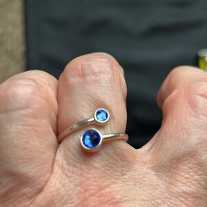 Alex and ani sterling silver 925 size 6 ring with sapphire stones.